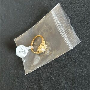 Elegant Gold Ring with Pearl Accent